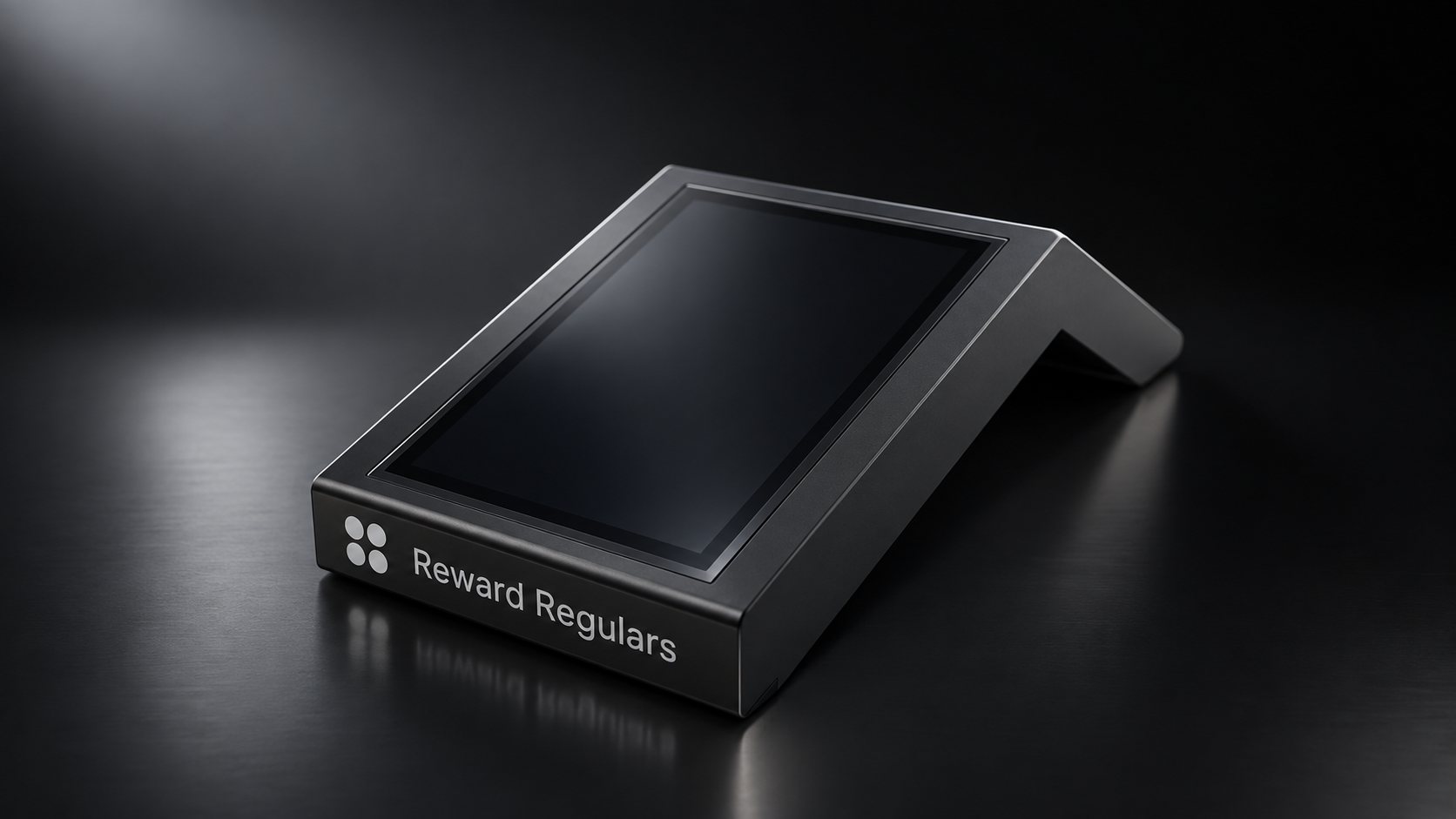 The Reward Regulars Counter Terminal: a black wedge with a portrait touchscreen on its sloped face and the Reward Regulars name along the front edge.